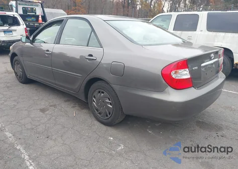 2003 Toyota Camry Le z USA, uszkodzony, nr VIN 4T1BE32K93U688485